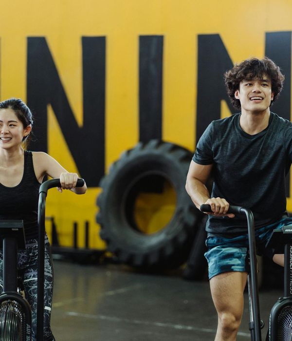 Woman in a dynamic cardio pose, feeling energetic and focused.